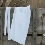 White waist apron with two pockets