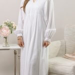 Plus-size LDS temple dress in soft white seersucker cotton with full skirt and side pockets