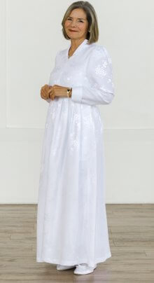 Nagoya Dress – Elegant white LDS Temple dress with a front zipper, floral jacquard fabric, pockets, and long sleeves.