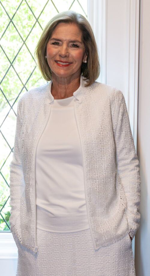 White lace LDS Temple womens suit with a zip-front jacket, deep pockets, and a modest, elegant design.