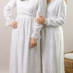 Branson white LDS temple dress with eyelet detailing, long sleeves, and modest full-length design