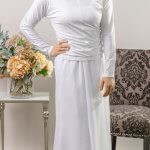 This top with its raglan sleeve is stretchy and mixes and matches with skirts or a pair of jeans for a casual look.